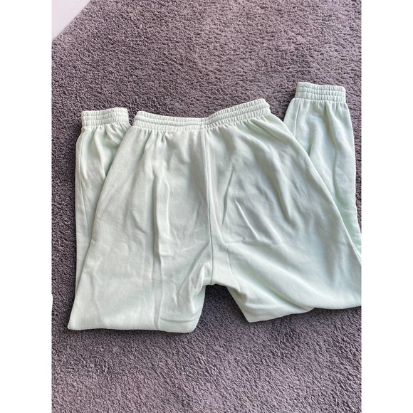 Divided Mint green joggers with purple smiley face, size XS - Picture 5 of 7